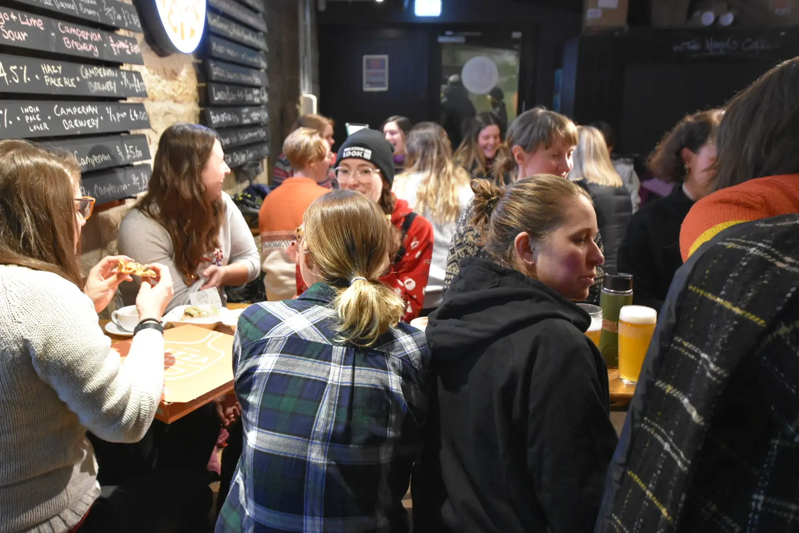 Group talking in a pub restaurant