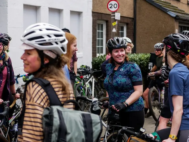 Image of riders chatting